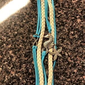 Seahorse starfish infinity sign teal boho bracelet
